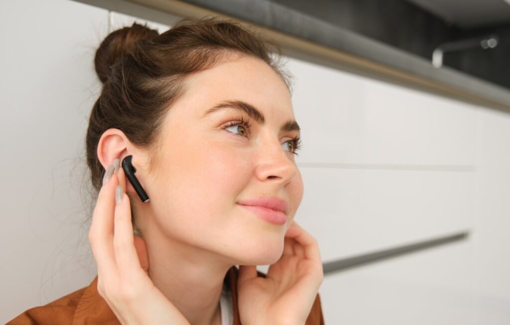 Best Wireless Earbuds 2025 – Sony WF-1000XM6 with charging case on desk