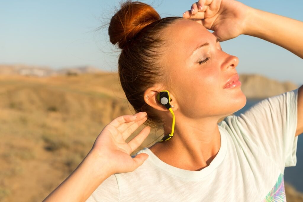 User wearing the Best Wireless Earbuds 2025 during workout session